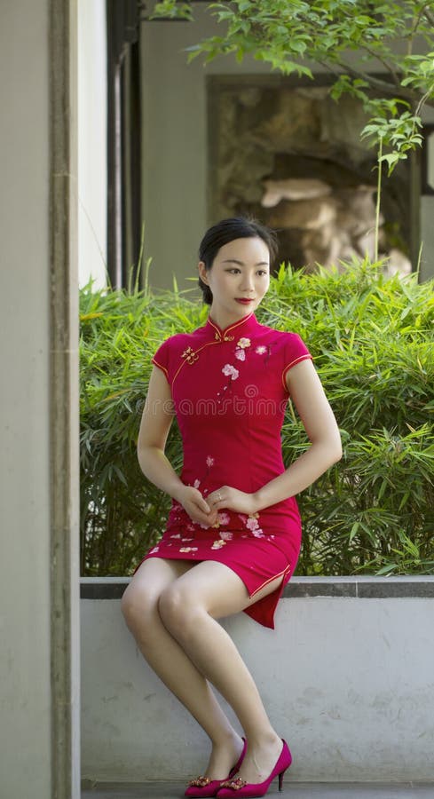 Chinese cheongsam model in Chinese classical garden royalty free stock photo Chinese cheongsam model in Chinese classical garden royalty free stock photo
